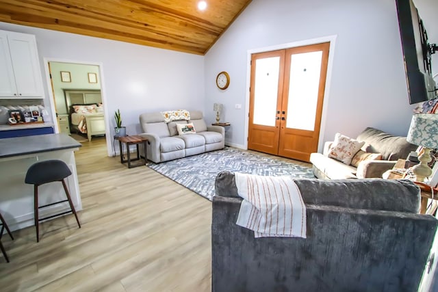 living room with french doors, light wood-type flooring, lofted ceiling, and wooden ceiling