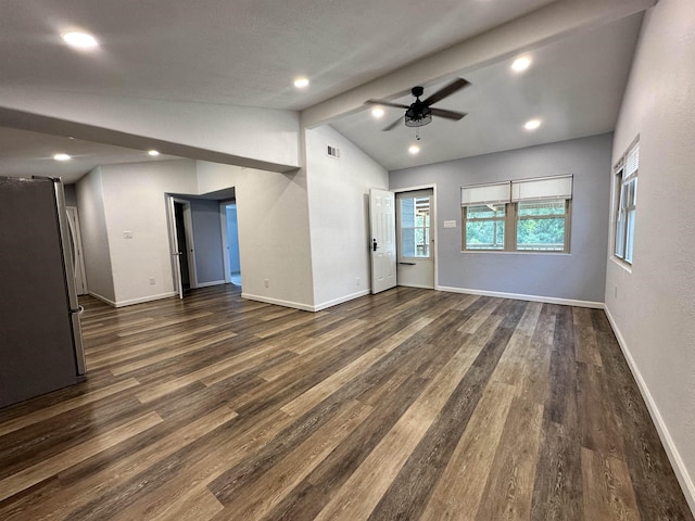 unfurnished living room with ceiling fan, lofted ceiling with beams, and dark hardwood / wood-style floors