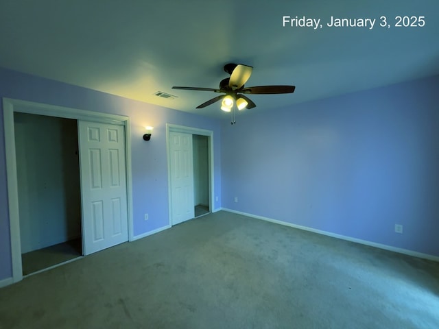 unfurnished bedroom with carpet and ceiling fan