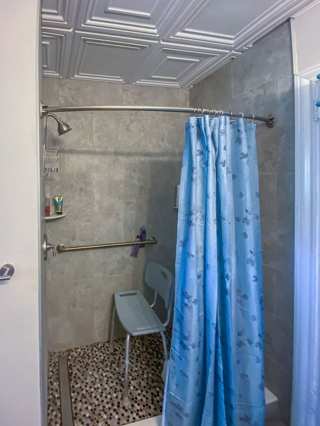 bathroom with a shower with curtain