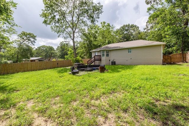 225 Jerri St, Lufkin, TX 75901 - fenced backyard featuring stairway and view of scattered trees