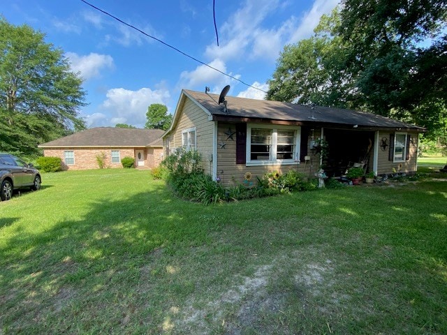 522 Mount Carmel Rd, Hudson, TX 75904 - view of front facade featuring a front lawn