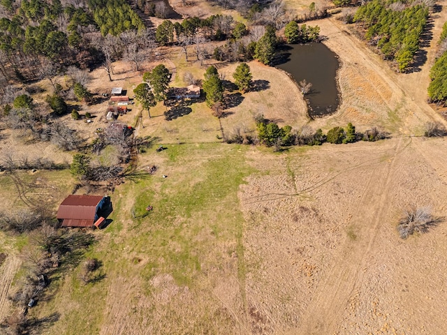 aerial view featuring a rural view and a water view