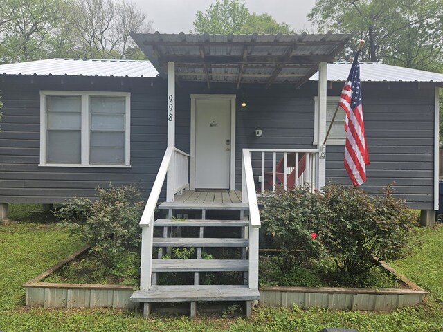 998 Winston 8 Ranch Rd, Lufkin, TX 75904 - view of front of house with metal roof