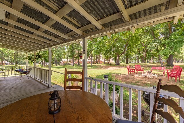 998 Winston 8 Ranch Rd, Lufkin, TX 75904 - wooden terrace featuring outdoor dining area and a yard