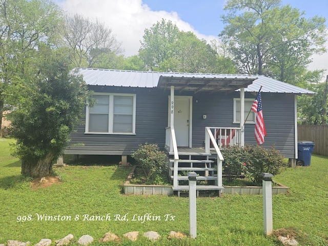 998 Winston 8 Ranch Rd, Lufkin, TX 75904 - bungalow featuring metal roof and a porch