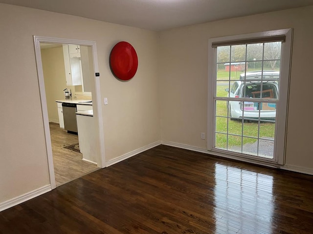 empty room with wood-type flooring