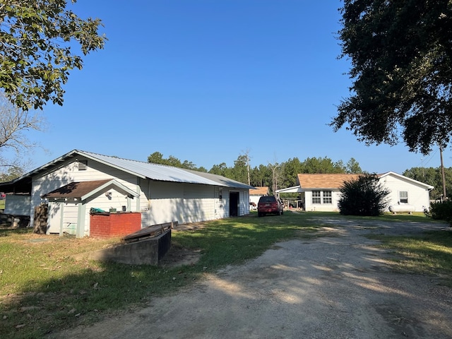 view of property exterior featuring a yard