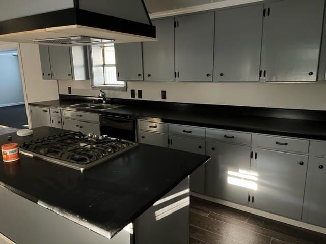 kitchen with dark wood-type flooring, sink, black dishwasher, custom range hood, and stainless steel gas cooktop