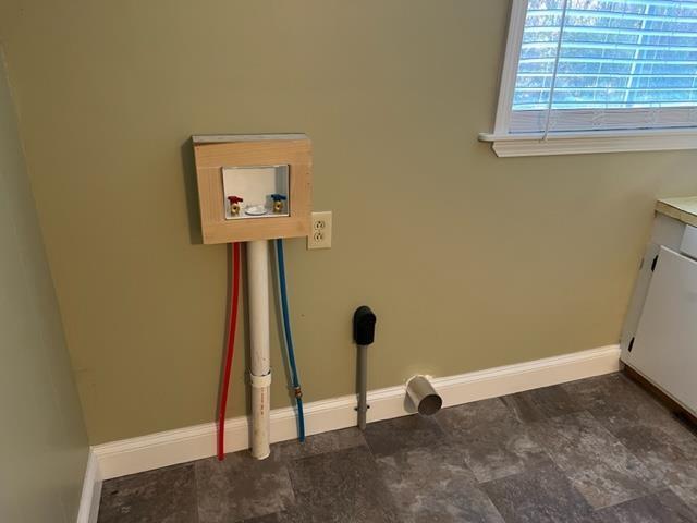 laundry area with cabinets and washer hookup