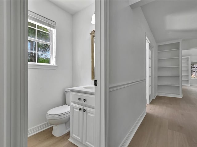 107 Bending Oak Dr, Lufkin, TX 75904 - bathroom with vanity, wood finished floors, and a closet