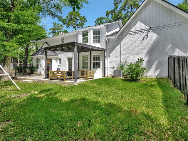107 Bending Oak Dr, Lufkin, TX 75904 - back of property with brick siding and a patio area