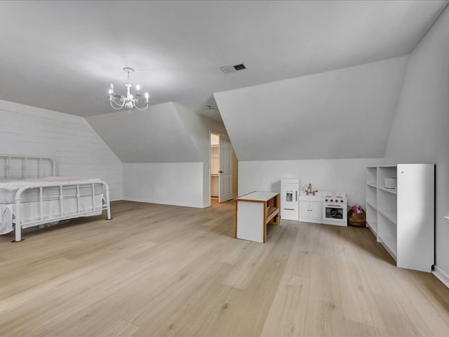 107 Bending Oak Dr, Lufkin, TX 75904 - bonus room featuring light wood-type flooring, lofted ceiling, and a chandelier