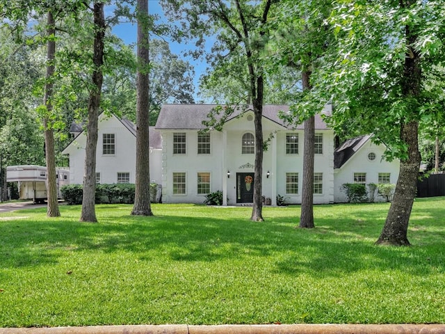 107 Bending Oak Dr, Lufkin, TX 75904 - neoclassical / greek revival house featuring stucco siding and a front yard