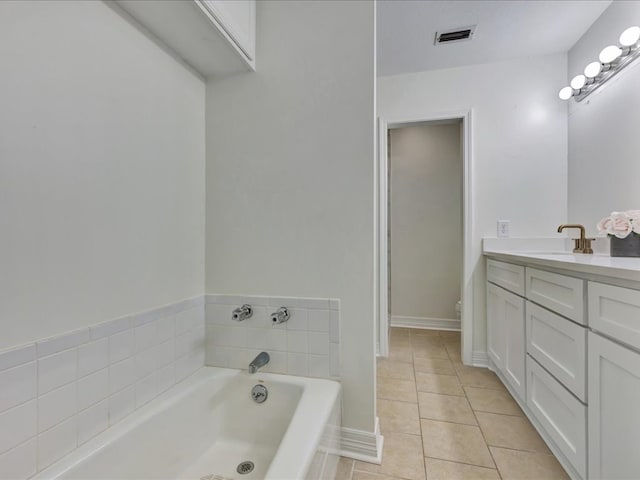 107 Bending Oak Dr, Lufkin, TX 75904 - bathroom with vanity, a bath, and tile patterned floors