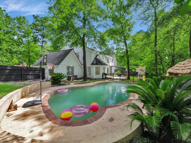 107 Bending Oak Dr, Lufkin, TX 75904 - view of swimming pool featuring a patio