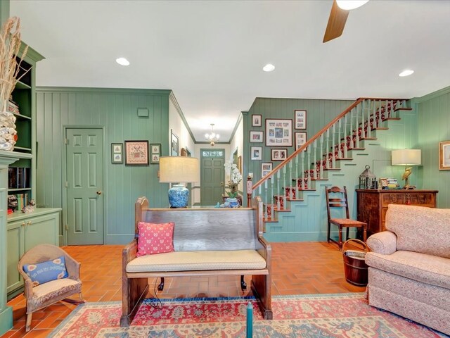 2211 Copeland St, Lufkin, TX 75904 - living room featuring recessed lighting, ornamental molding, stairs, and ceiling fan