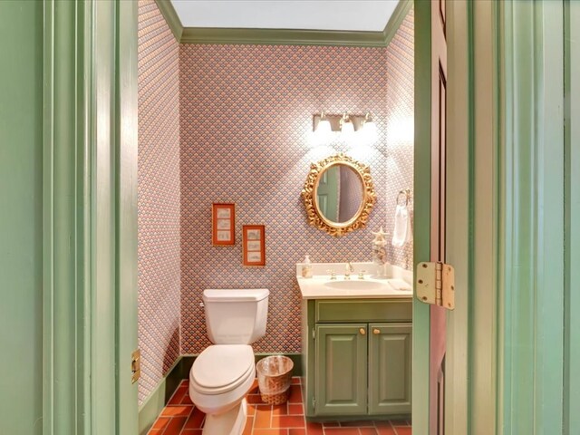 2211 Copeland St, Lufkin, TX 75904 - full bath with vanity, toilet, tile patterned flooring, and crown molding