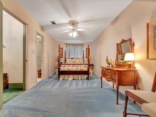 2211 Copeland St, Lufkin, TX 75904 - carpeted bedroom featuring baseboards, visible vents, and a ceiling fan