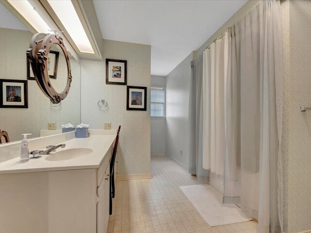 2211 Copeland St, Lufkin, TX 75904 - full bath featuring vanity and baseboards