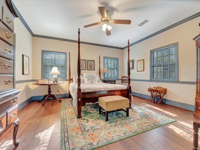 2211 Copeland St, Lufkin, TX 75904 - bedroom with baseboards, visible vents, multiple windows, and hardwood / wood-style flooring