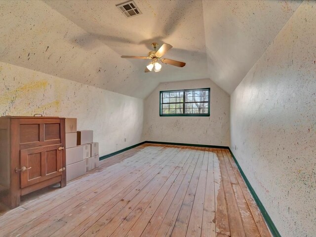 2211 Copeland St, Lufkin, TX 75904 - bonus room with a ceiling fan, visible vents, vaulted ceiling, and light wood-type flooring