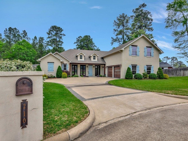 210 Mission Hills Dr, Lufkin, TX 75901 - traditional-style home featuring a front yard, concrete driveway, stucco siding, and fence