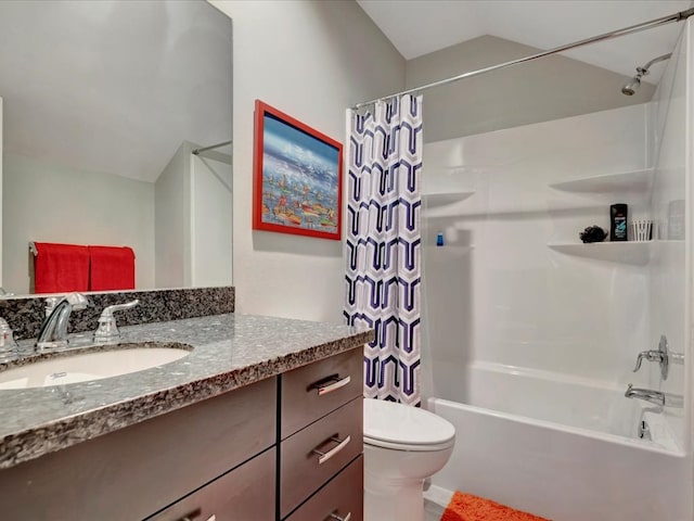 full bathroom featuring shower / bath combo with shower curtain, toilet, and vanity