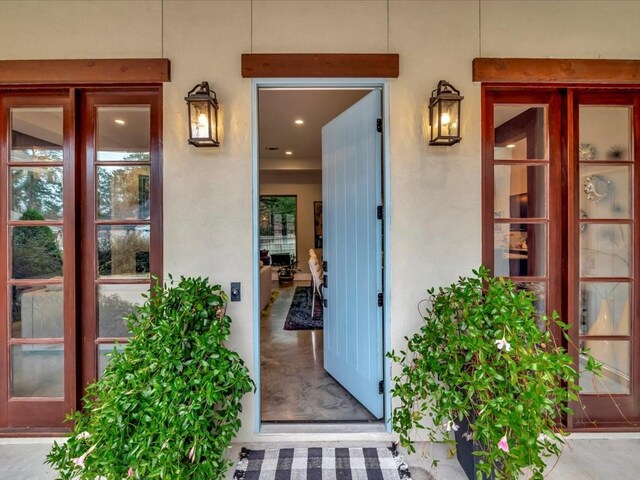 210 Mission Hills Dr, Lufkin, TX 75901 - property entrance featuring stucco siding and french doors