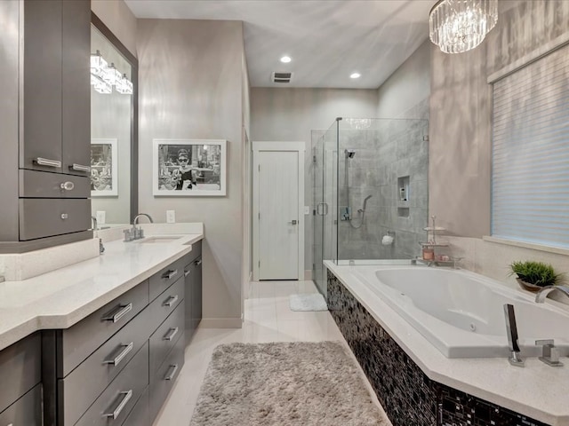 bathroom featuring tile patterned floors, vanity, and plus walk in shower