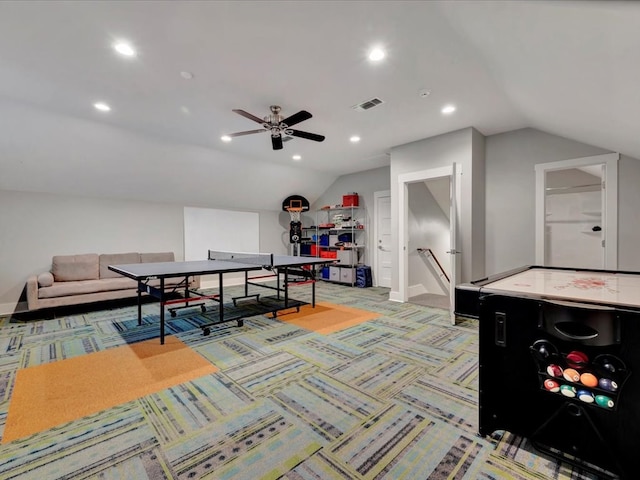 recreation room with light carpet, ceiling fan, and lofted ceiling