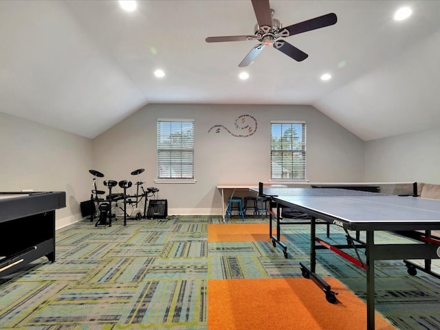 game room featuring vaulted ceiling, ceiling fan, and light colored carpet