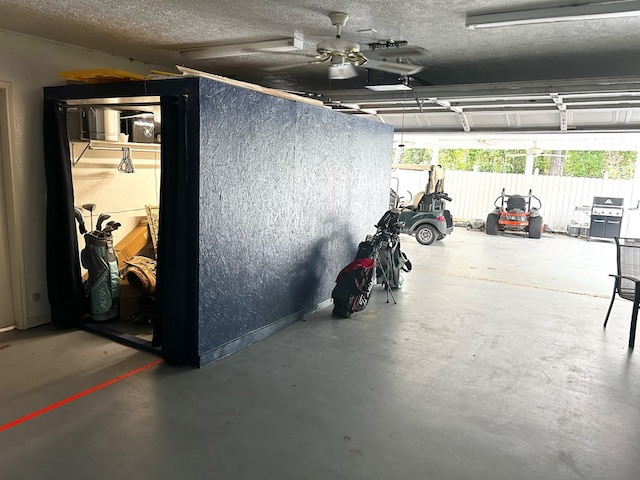 garage featuring ceiling fan