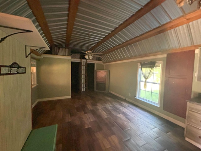 unfurnished living room with vaulted ceiling with beams, ceiling fan, and dark hardwood / wood-style flooring