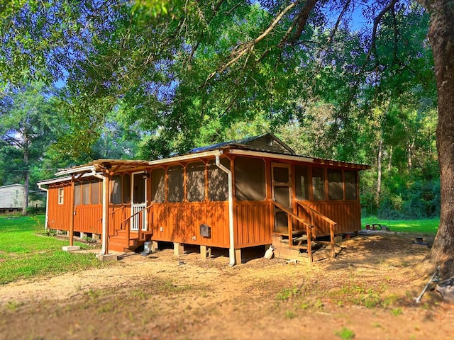 exterior space with a sunroom