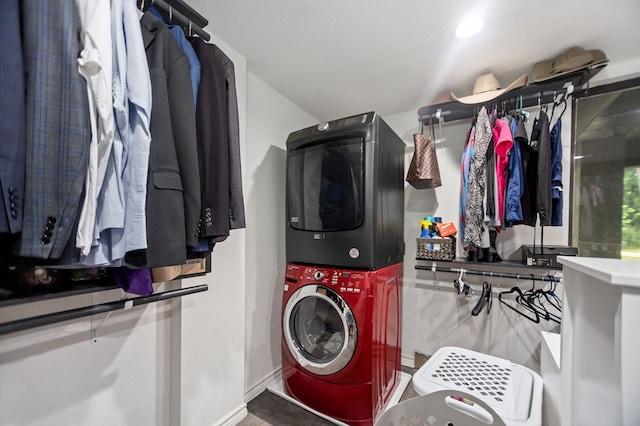 laundry room with laundry area and stacked washing maching and dryer