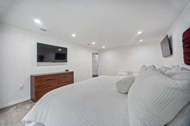 carpeted bedroom with baseboards, recessed lighting, and visible vents