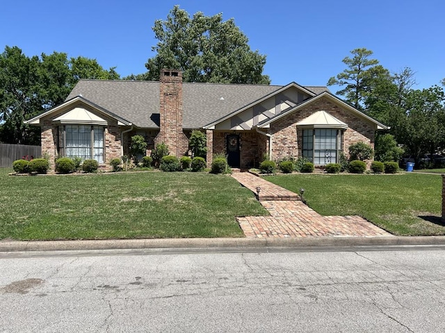 view of front of house with a front yard