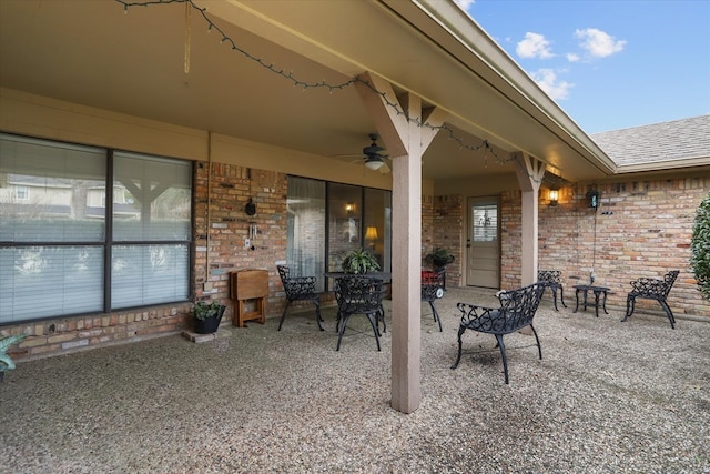 view of patio / terrace featuring ceiling fan