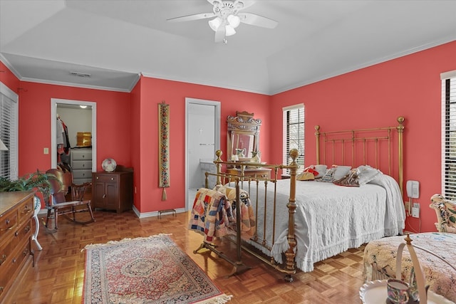 bedroom featuring parquet flooring, vaulted ceiling, ceiling fan, and crown molding