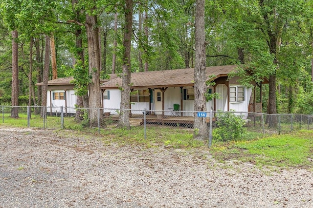 ranch-style home with covered porch