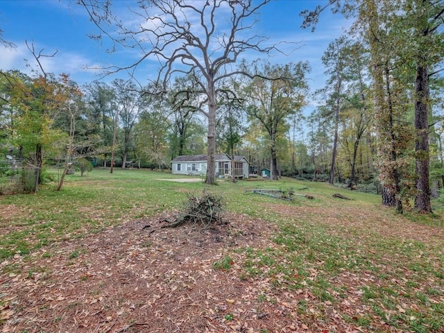 309 County Barn Rd, Lufkin, TX 75904 - view of green lawn featuring a view of trees