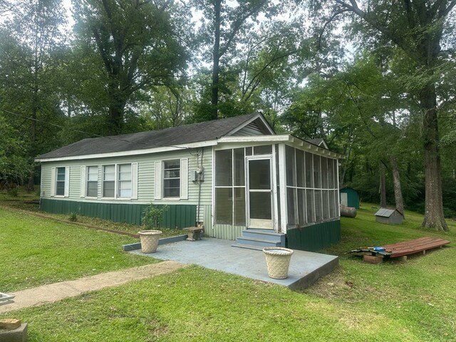 309 County Barn Rd, Lufkin, TX 75904 - view of shed with a sunroom and entry steps