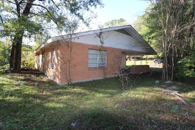 view of home's exterior with a lawn