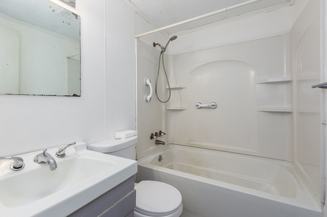 bathroom with vanity, toilet, shower / bath combination, and a textured ceiling