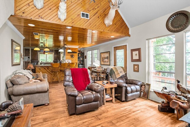 183 Holly Cir, Etoile, TX 75944 - living room featuring wood finished floors, plenty of natural light, and crown molding