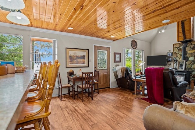 183 Holly Cir, Etoile, TX 75944 - home office featuring light wood-style floors, crown molding, a wood stove, recessed lighting, and wood ceiling