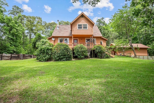 183 Holly Cir, Etoile, TX 75944 - back of property featuring a wooden deck and stairs