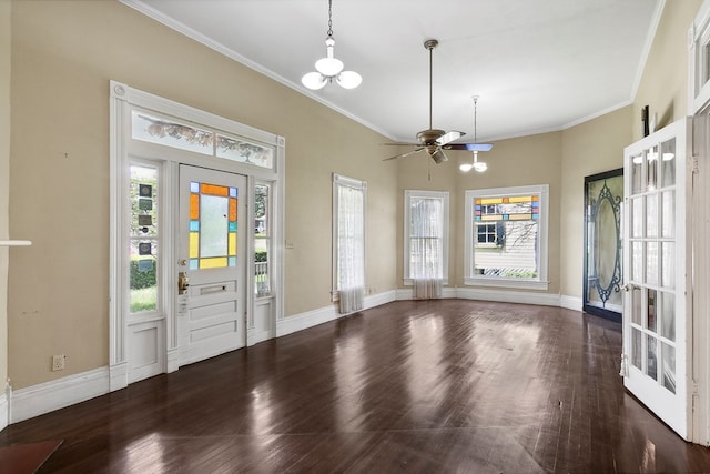 foyer entrance featuring crown molding, dark hardwood / wood-style floors, and ceiling fan