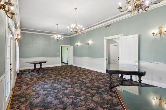 dining area with ornamental molding and a notable chandelier